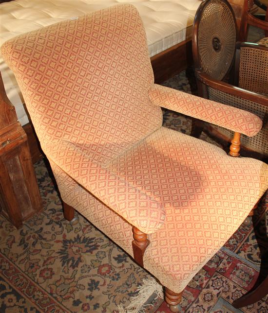 Victorian re-upholstered fire side armchair
